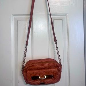 Orange cross body bag